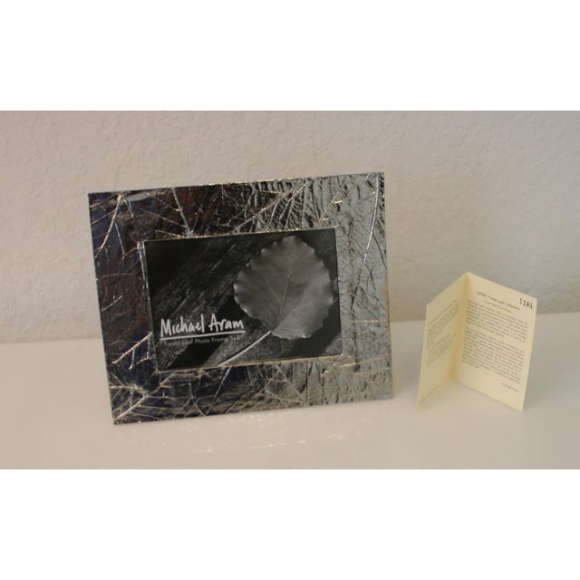 New Discontinued Michael Aram Handcrafted Nickel 5 x 7 Photo Frame Forest Leaf Collection This photo frame is new, unused,...