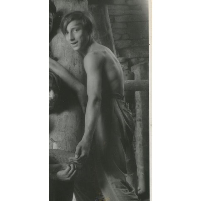 Silver Gelatine Print by Erich Andres, 1950 This black-and-white photograph from 1950 shows three young men working in...