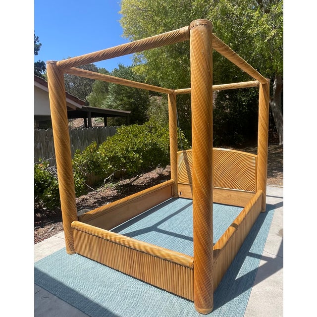 Boho showstopper! This vintage canopy bed is a real statement piece, it has such a cool “70s-chic” vibe presence. It...