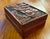 Antique 19th century Chinese carved cinnabar lacquer box. Decorated with court figures in a traditional landscape. The...