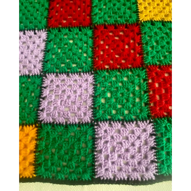 Vintage Hand Crocheted blanket/throw is designed with a multicolor granny squares pattern that is stunning, cozy and...