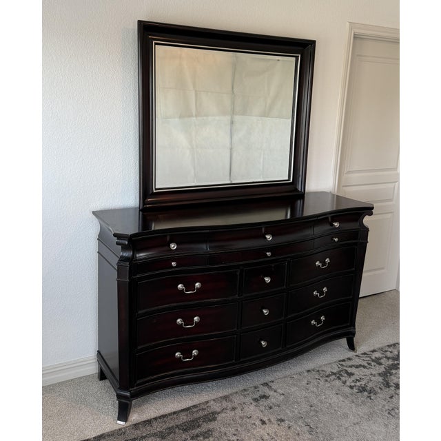 Elegant Storage with a Timeless Silhouette Incorporate classic sophistication into your bedroom with this expansive...