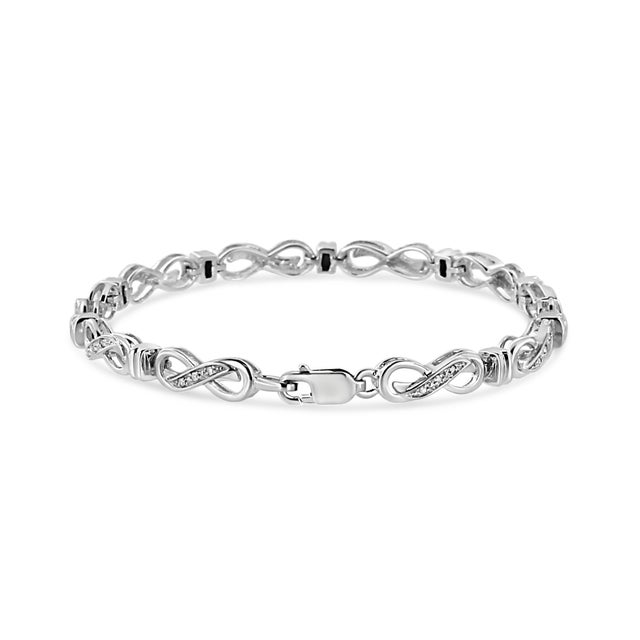 Showcase your everlasting love by gifting this infinity link bracelet. Each link is created in genuine .925 sterling...