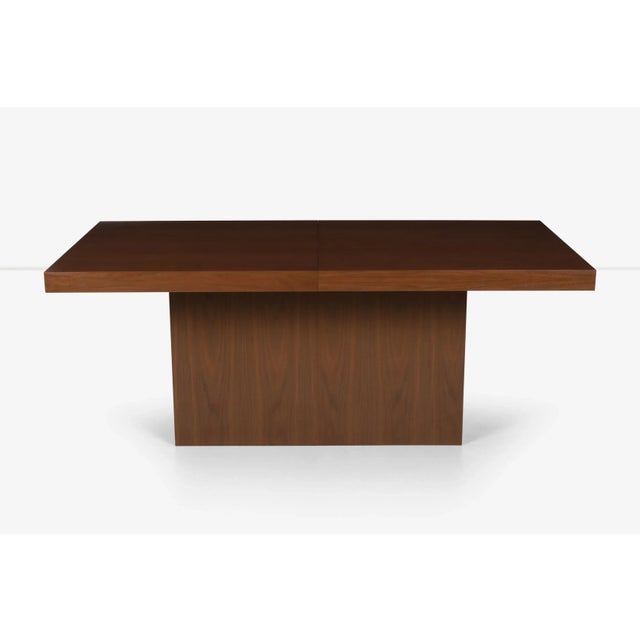 Milo Baughman style dining table, walnut lacquered veneer with pedestal base 71.50" in length with two 18" leaves expands...