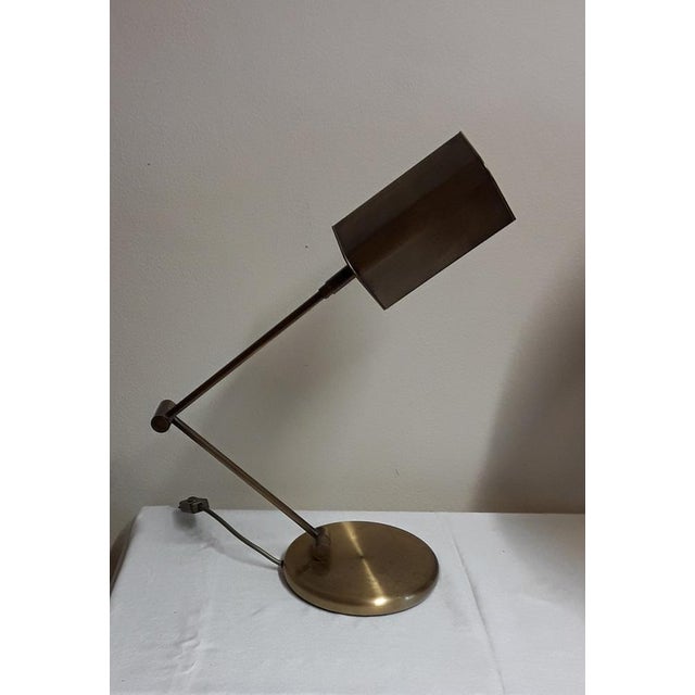 Vintage German Table Lamp with a Gold-Colored Adjustable Frame from Sölken Lights, 1970s, in Good conditions. Designed...