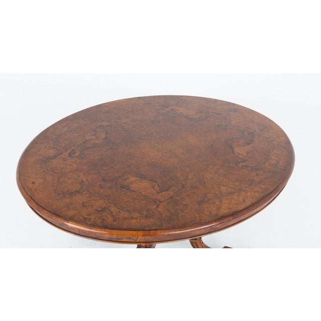Victorian burr walnut loo table This table is of an oval form Circa 1860 The top features the most wonderful burr walnut...