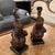 Design Plus Gallery presents a Pair of Bunnies Sitting on Balls from Attila's. The bunnies are made from some sort of...