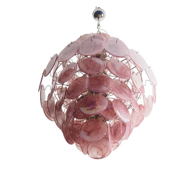 Pink and Lilac Murano Glass Chandelier, Luminous Disc Sculpture Murano glass chandelier featuring a sculptural composition...