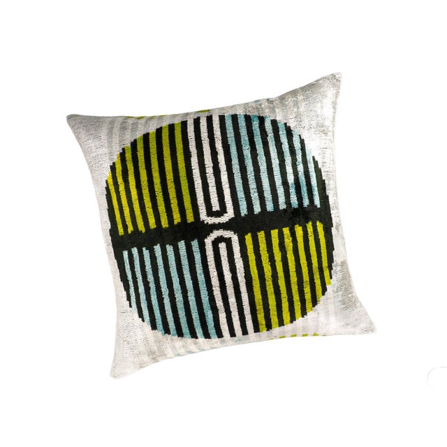 The Tamga Silk Velvet Ikat Pillow Cover is where ancient weaving meets contemporary minimalism. Its bold circular...
