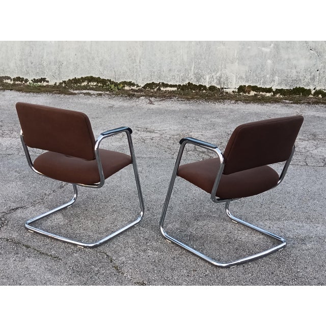 Wide fabric armchairs on cantilever base - Strafor = les FORges de STRAsbourg This piece has an attribution mark, I am...