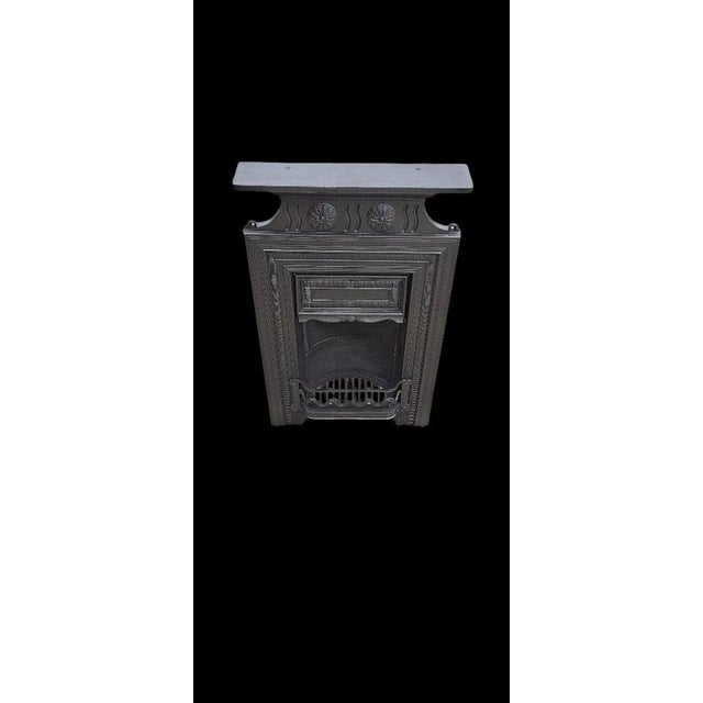 A superb original Victorian cast iron combination fireplace dating precisely to 1896, reclaimed from a period property in...