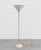 Mid Century Modern Italian torchiere floor lamp, c. 1960’s. Featuring a beautifully streamlined silhouette, slender...