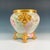 Presenting an exquisite Mid 20th Century Limoges porcelain jardiniere and stand set. This two-piece ensemble features a...