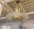 Stunning Art Deco grand theater chandelier. Having a ribbed motif on the brass metal frame. The 48 inch diameter gives a...