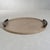 A twist to a traditional tray, this sophisticated Cameroon Mink Leather Serving Tray is a well-made piece that will last...