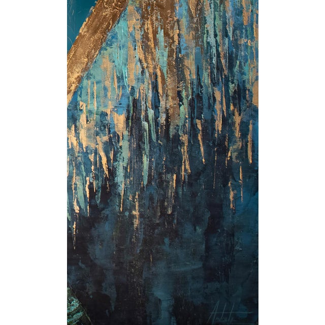 Blue Aura presents a striking portrait of a figure enveloped in a vibrant blue hue, accentuating the ethereal quality of...