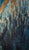 Blue Aura presents a striking portrait of a figure enveloped in a vibrant blue hue, accentuating the ethereal quality of...