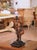 This distinctive antique table lamp is formed from a 19th century hand-carved wooden figure depicting a rustic male...