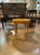 This 19th-century German Biedermeier walnut table exudes a sense of timeless elegance and craftsmanship. With its rich...