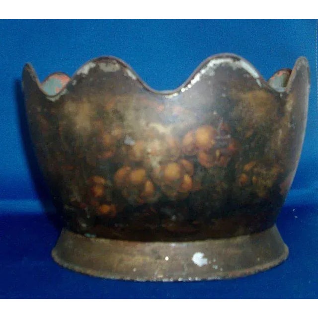 A lovely 19th c. tole montheith or centerpiece basket with raised foot and an overall stencil design of fruit similar to...