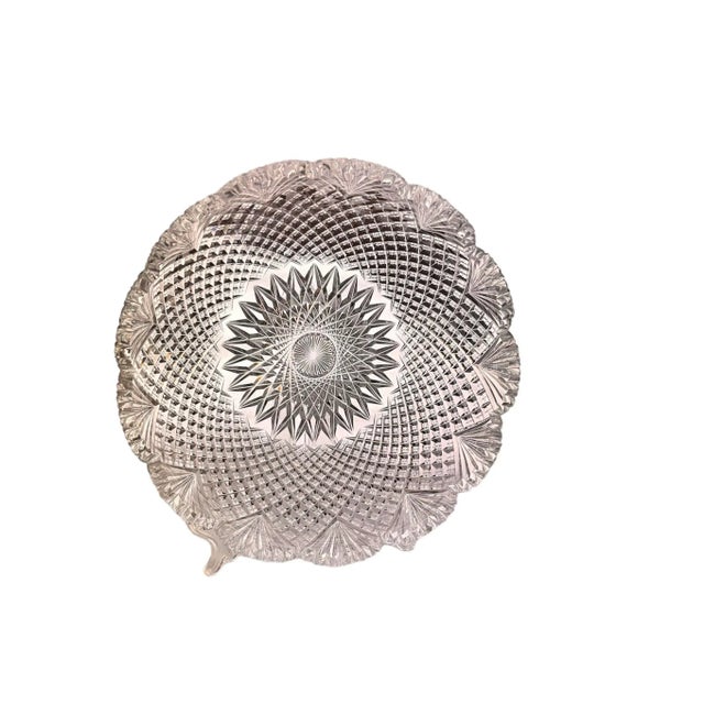 An antique hand cut crystal serving bowl from the American Brilliant Period. Strawberry Diamond and Fan hand-cut design....