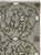 This mid-20th-century Turkish Anatolian throw rug presents a disciplined allover composition of paired floral medallions...