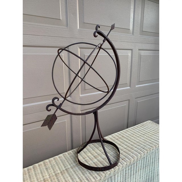 A beautifully crafted large iron armillary sphere, evoking the timeless elegance of classical European gardens. Pieces...