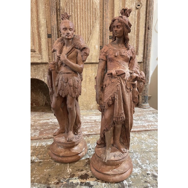 A exceptional pair of early 19th c. French terracotta figures depicting the personification of the Americas, each signed...
