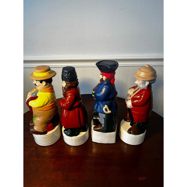 Vintage set Of 4 Alberta’s ceramic liquor fecaters . They are labled wine, vodka, rum, & Gin in gold lettering. Produced...