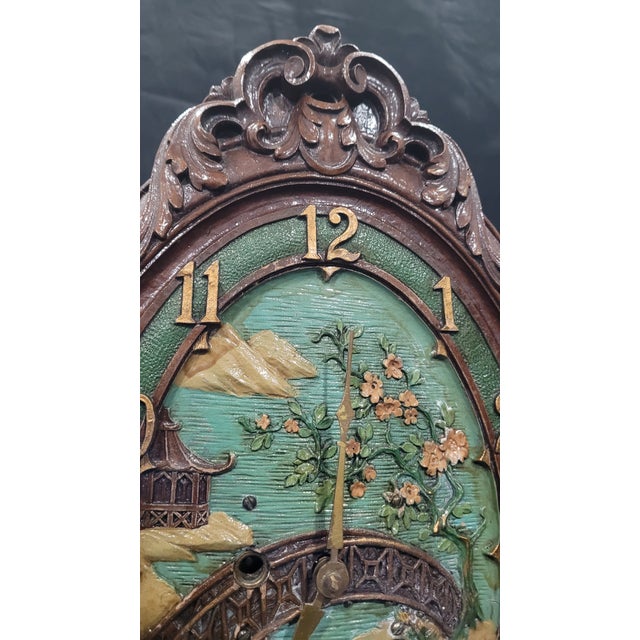 Manufacturer: Lux Clock Manufacturing Company (Waterbury, CT) Model: "Blossom Time" Historical Date: Hand-dated on the...