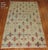A vintage one of a kind Turkish Anatolian rug with a all-over repetitive design on a bone colored field. 5'1' x 9'8''
