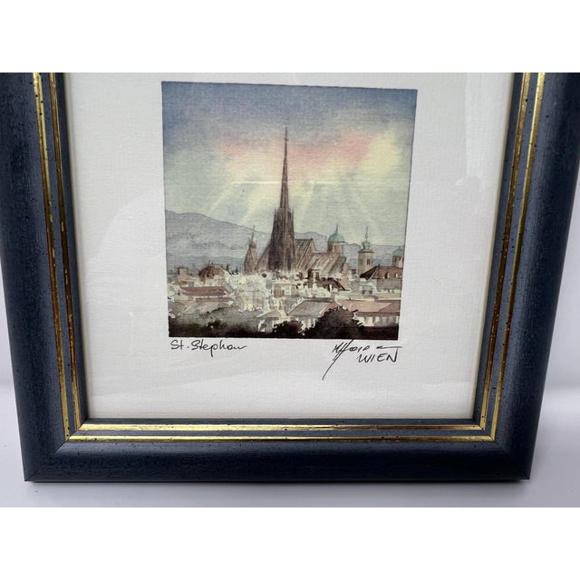 A charming vintage architectural art print depicting St. Stephen’s Cathedral (Stephansdom) in Vienna, produced by Studio...
