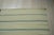 A handwoven wool flatweave, made in India and measuring 9' x 12'. No pile means the geometry is woven through the...