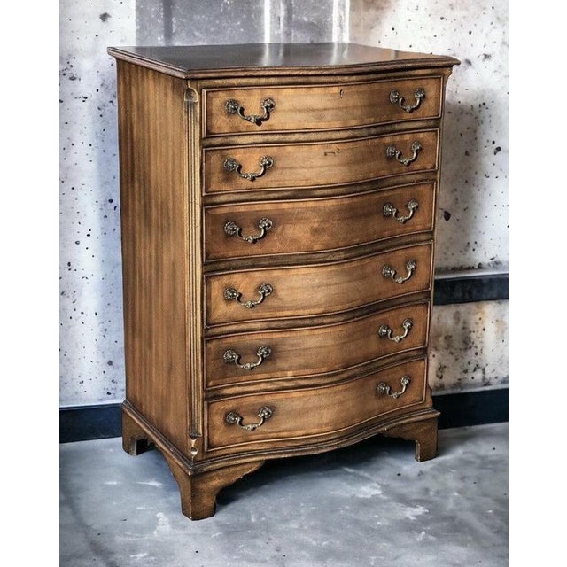 Chest Of Drawers, Serpentine Front. Strong Solid. Drawers open smoothly. Sizes :- 104 cms high, 71 cms wide, 50 cms depth.