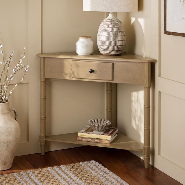 This Gomez Table was designed with small living spaces in mind. Gomez's triangular pine wood frame easily fits into any...