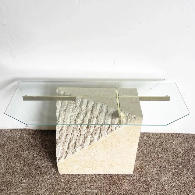 Amazing vintage postmodern tessellated stone console table. Features polished side with a rough stone are under the glass....