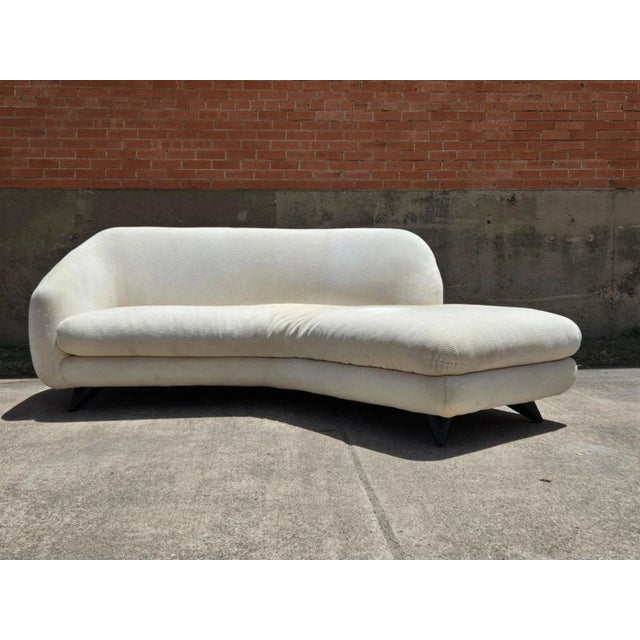 A rare find, the Tangent sofa with an open chaise feature by Vladimir Kagan Angle Tangent Sofa for Preview is an exquisite...