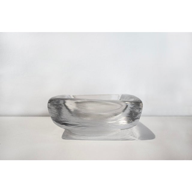 Centerpiece in heavy, clear glass with a glazed surface. Manufacturer: Orrefors 1960s I have official proof of...