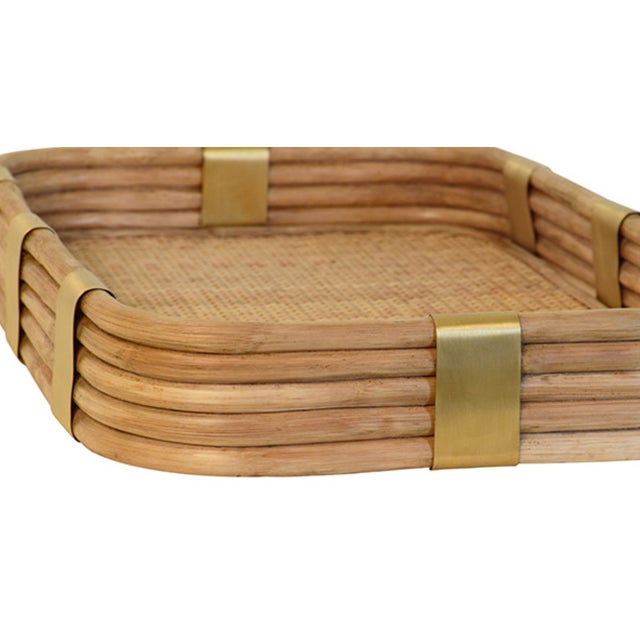 Serve up style with the Barley Rattan &amp; Brass Serving Tray—where natural texture meets gleaming elegance. This...