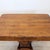 Refined antique Italian coffee table dating back to the early 19th century. It features the stylistic and construction...