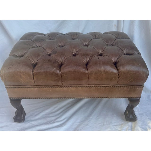 This traditional Chesterfield Queen Anne style leather tufted footstool is the perfect piece to add a little warmth and...