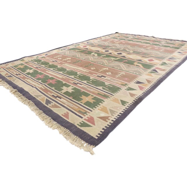 Vintage Indian Stone Wash Dhurrie Rug with Folk Art Style 05'05 x 08'07.?? Full of tiny details and a bold expressive...