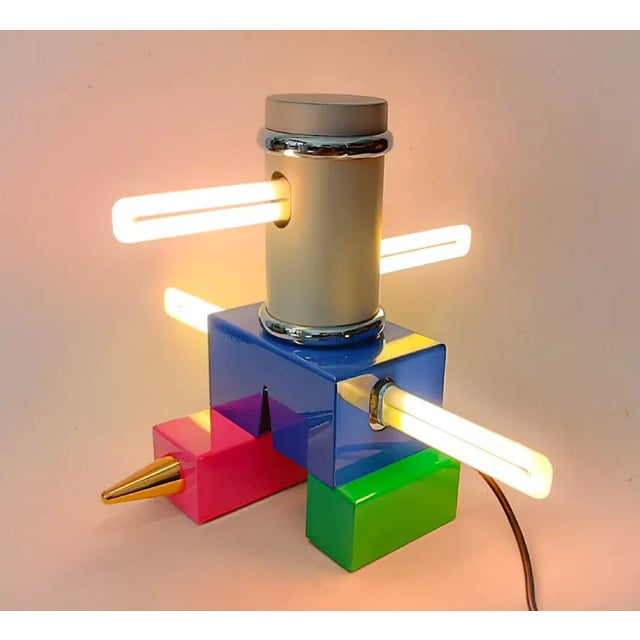 Laurel lamp designed by peter shire and produced from memphis milan since 1985. new object, therefore in excellent...