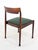 This set of four elegant dining chairs is a beautiful example of Mid-Century Modern design, crafted from high-quality...