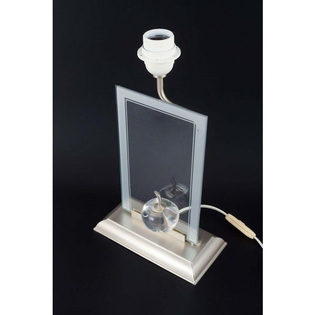 Le Dauphin, France. Table lamp with sculptural glass apple. 1980s Table lamp with rectangular glass plate featuring an...