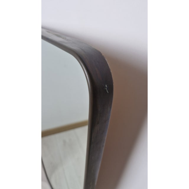 Vintage Mirror with Brass Sinuose Frame in the style of Gio Ponti, 1950s, in Very Good conditions. Designed 1950 to 1959...