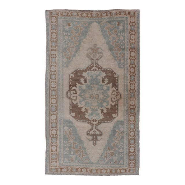 Mid Century Turkish Oushak Rug in Wool With Sub-Geometric Etched Medallion Design For Sale