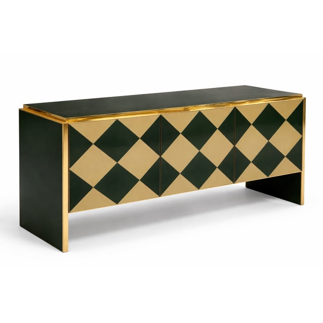 Murano glass sideboard with a diamond pattern and gilded brass trim. This Art Deco sideboard features a geometric pattern...