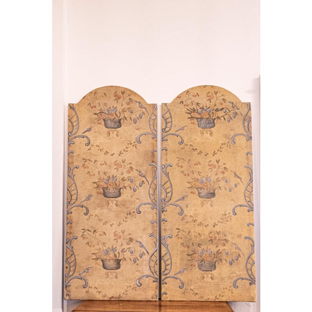 A pair of French 18th century hand-painted decorative panels with silver vases birds in foliage. This enchanting pair of...