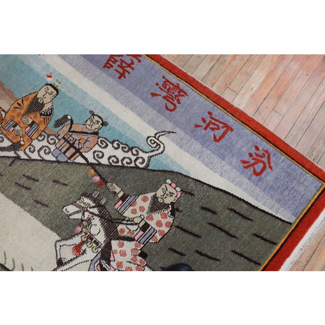 an early 20th century East Turkestan Khotan Pictorial rug Measures: 5'8'' x 8'8''.